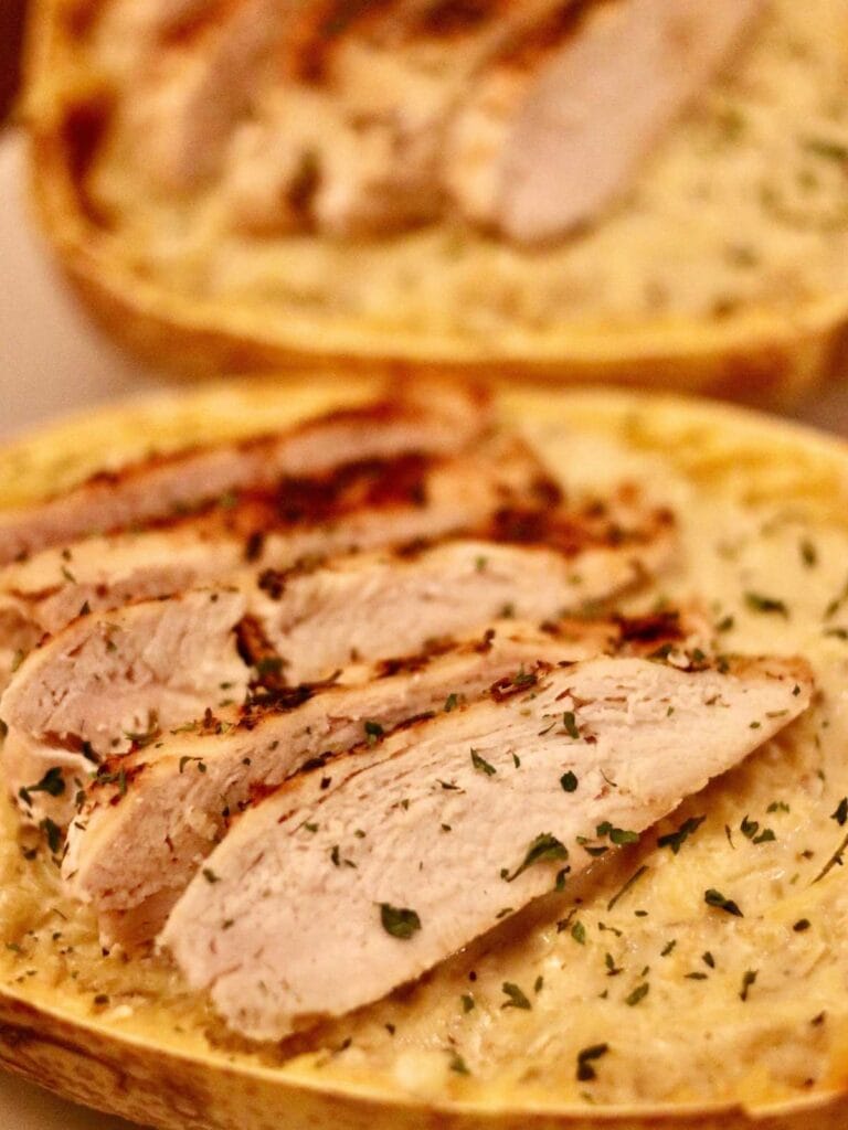 Chicken Alfredo spaghetti squash on a tray