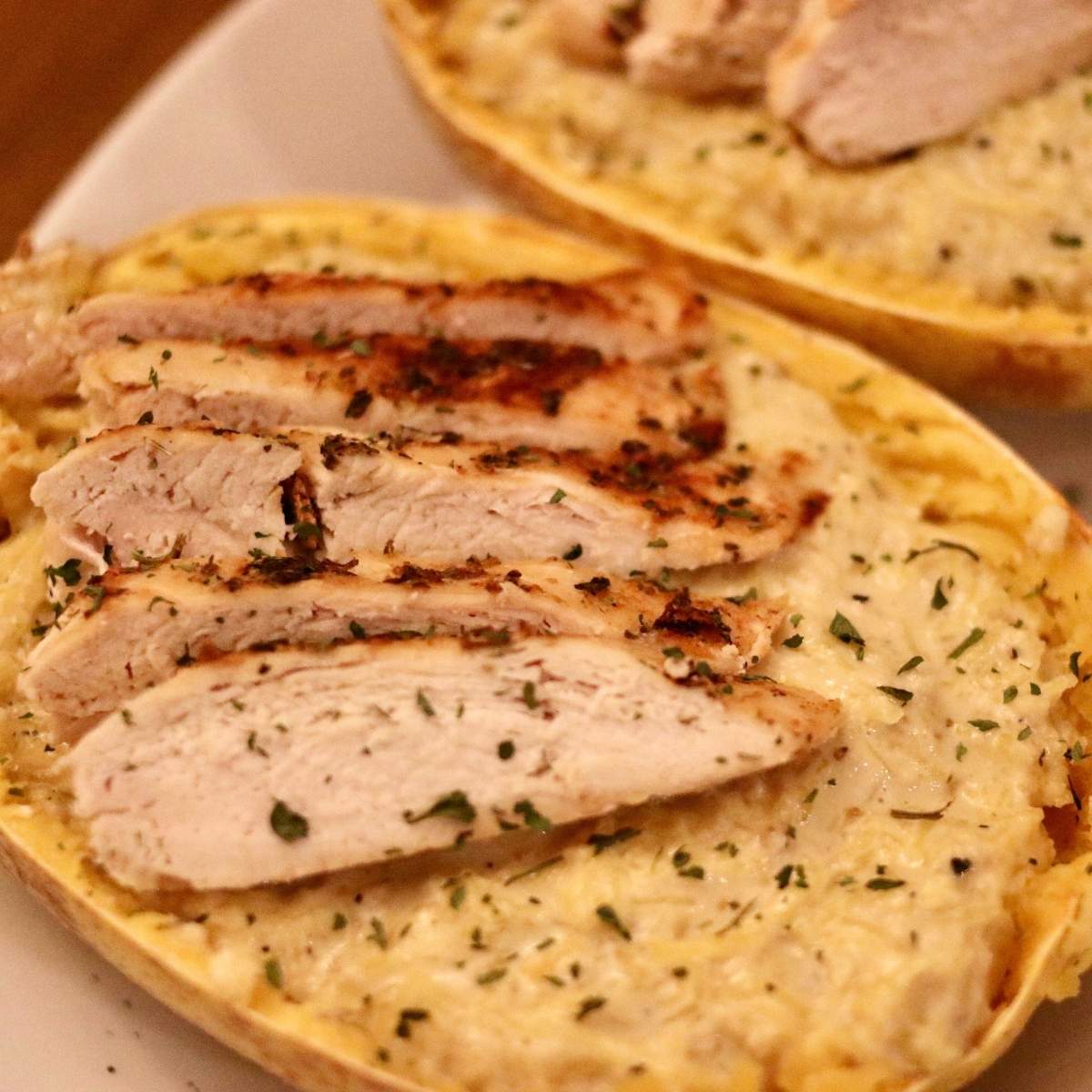 Closeup side angle of chicken Alfredo spaghetti squash