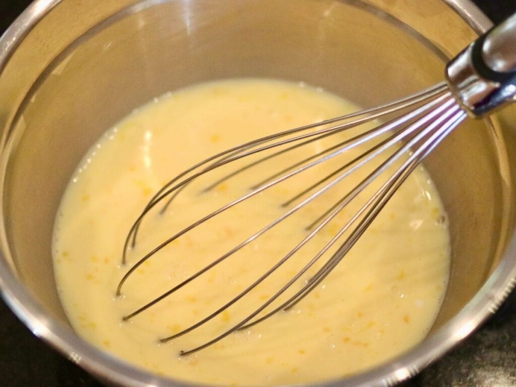 Whisking egg mixture together