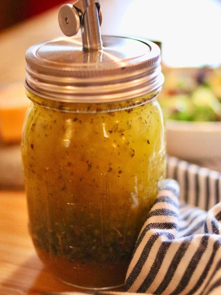 Jar of Italian vinaigrette with pour spout
