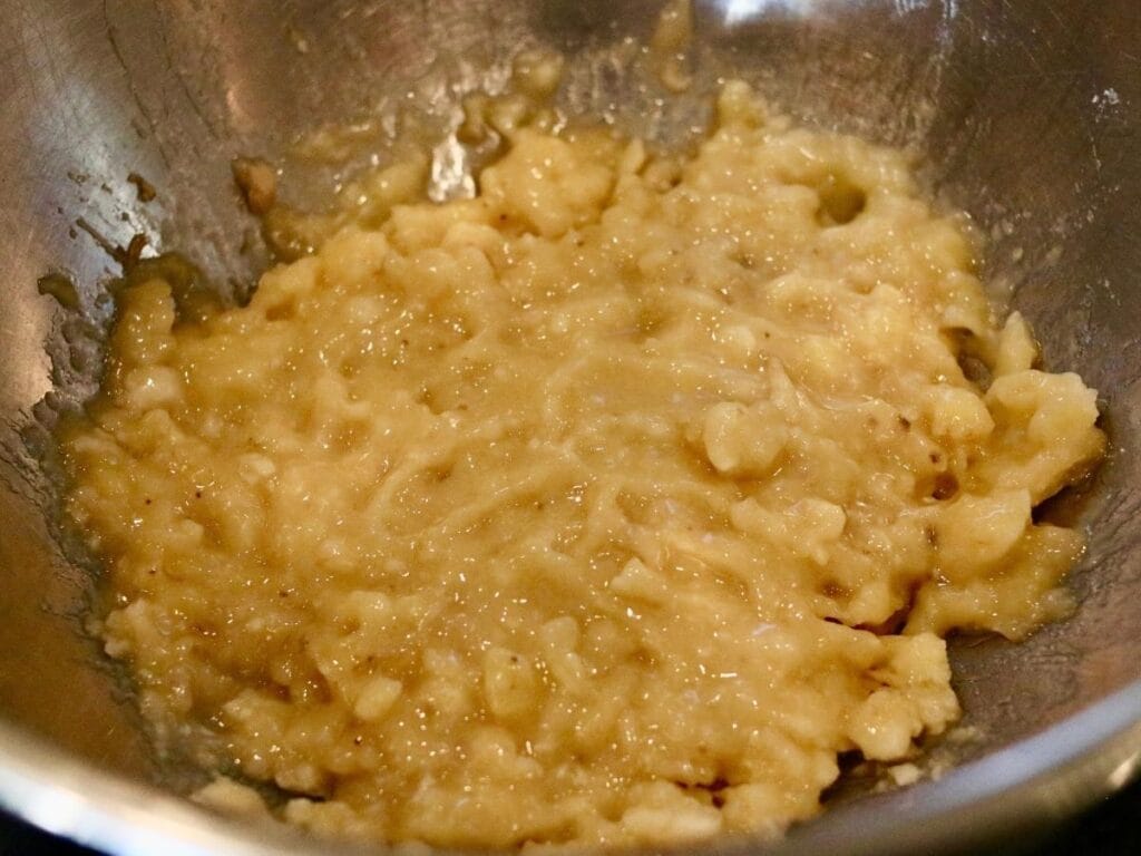 Mashed bananas in a bowl.