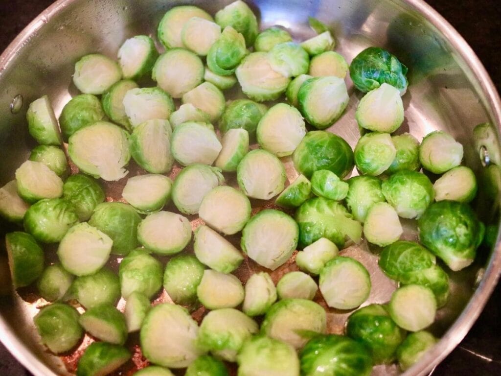 Steamed Brussels sprouts in a skillet
