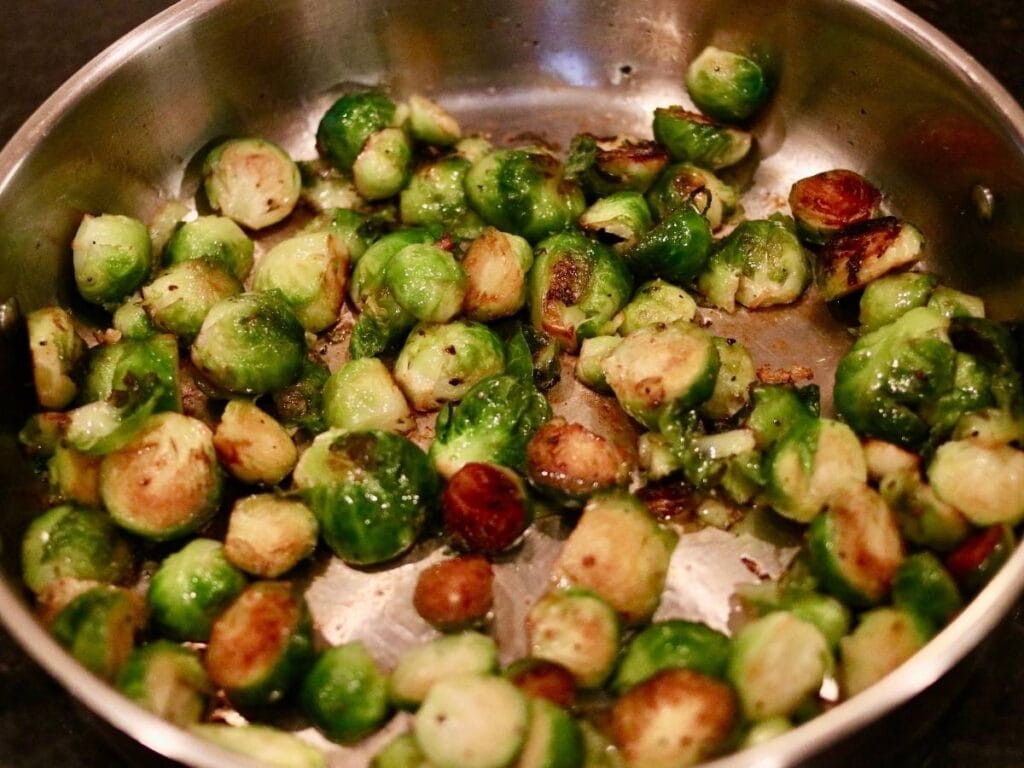 Cooked Brussels sprouts in a skillet