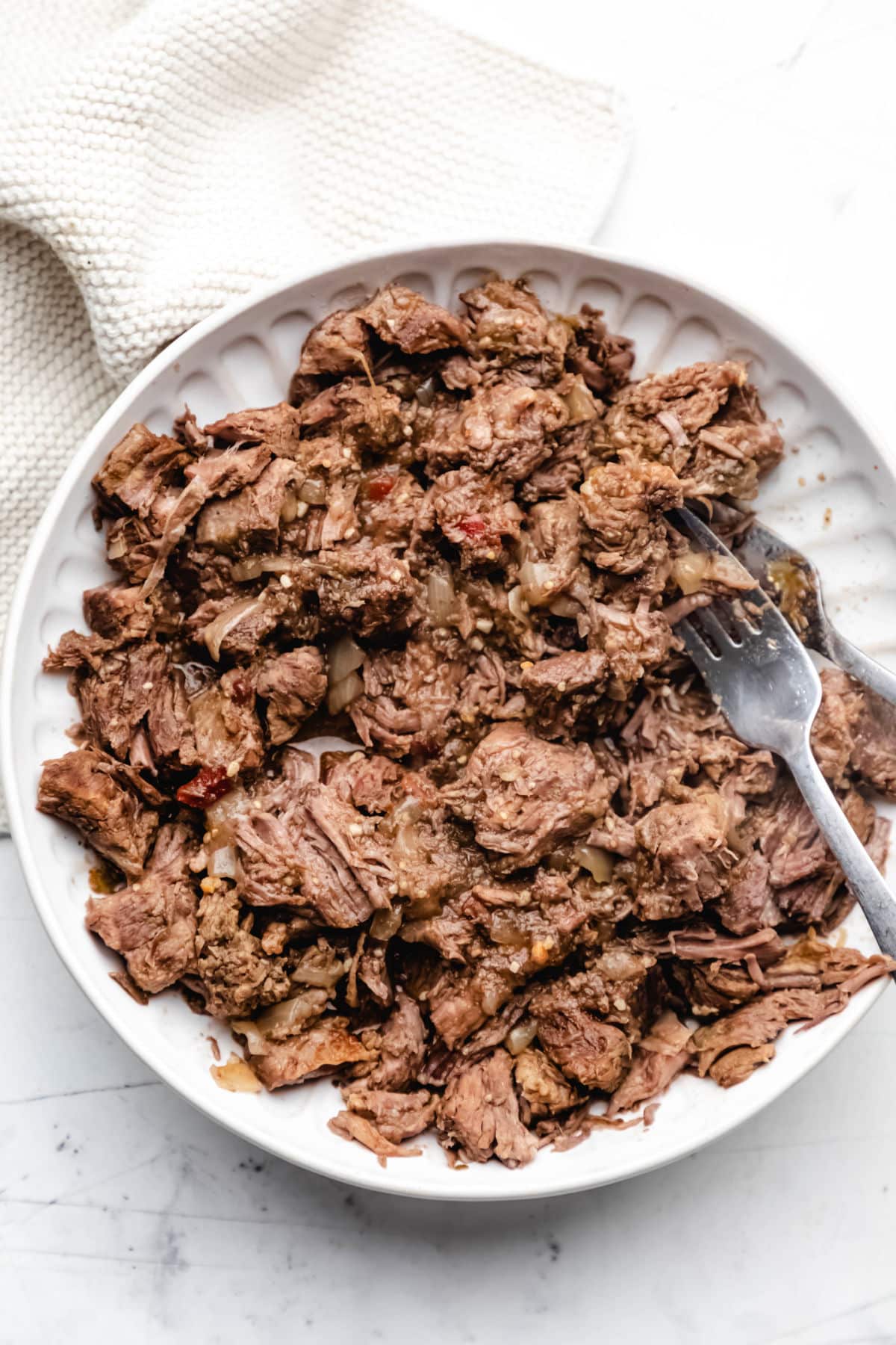 salsa verde beef on serving dish