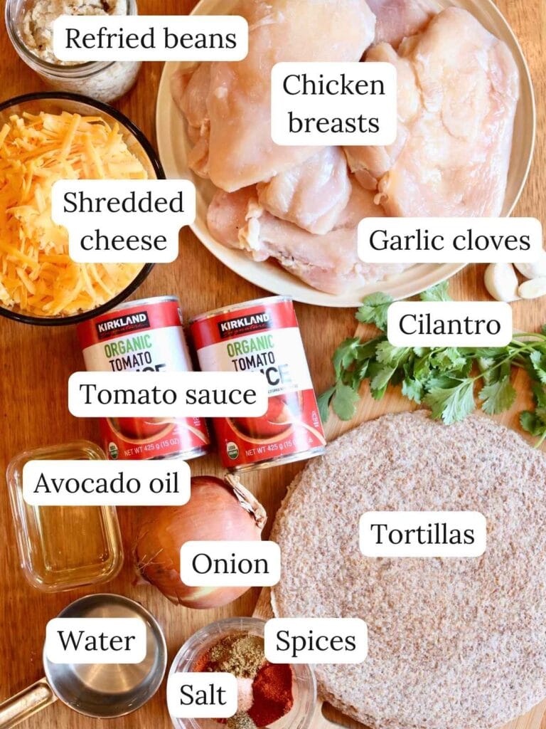 Ingredients for chicken enchilada casserole on a counter.