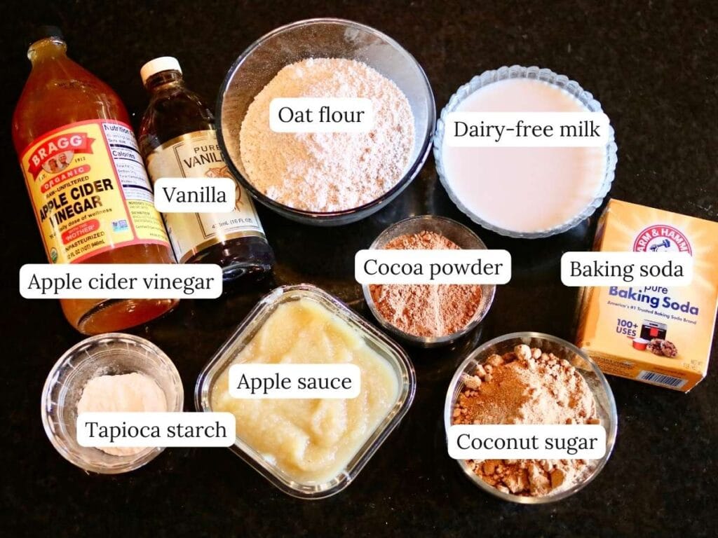 Ingredients for gluten-free vegan chocolate cupcakes on a counter.