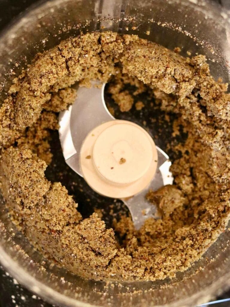 Mixing protein ball ingredients in a food processor.
