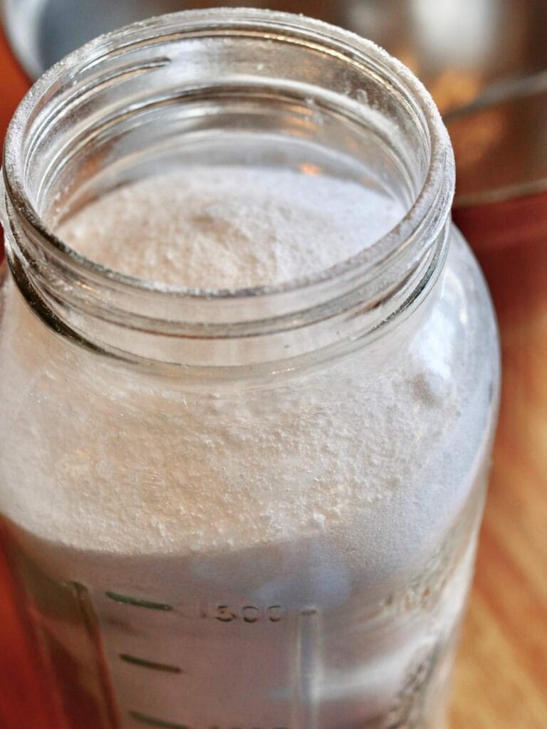 Cloth diaper detergent in a glass jar.