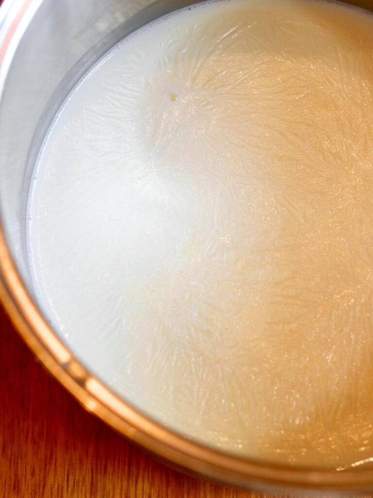 Scaled milk in a saucepan.
