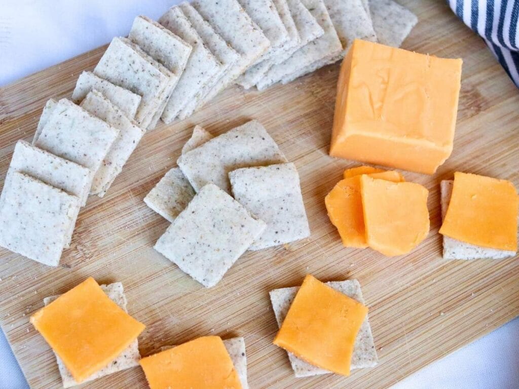 Tray with almond flour crackers and cheese.