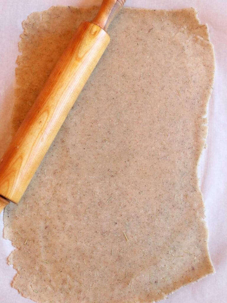 Almond flour dough thinly rolled out.