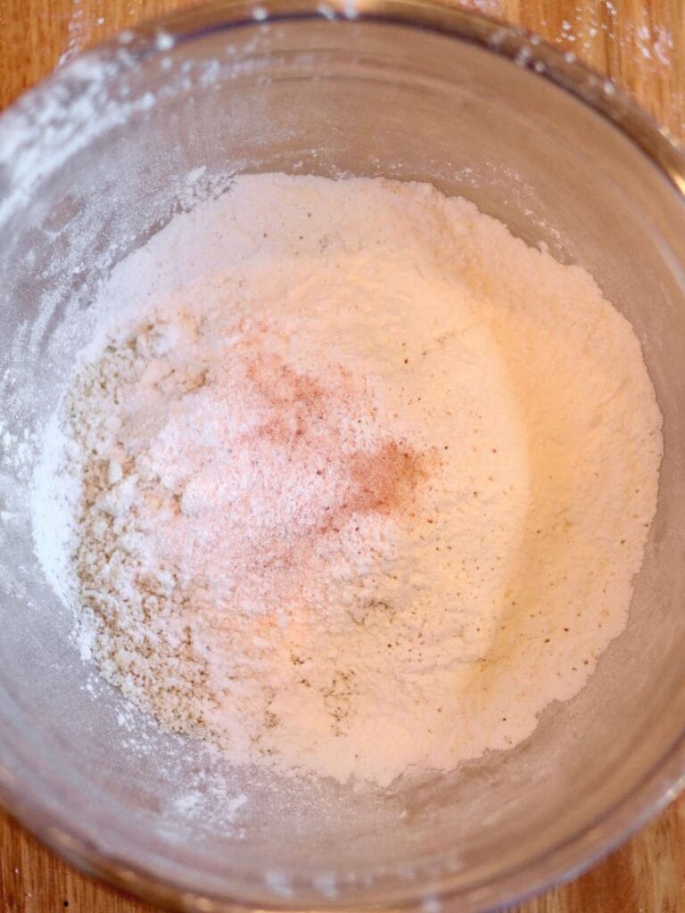Dry ingredients including almond flour and tapioca starch in a bowl.