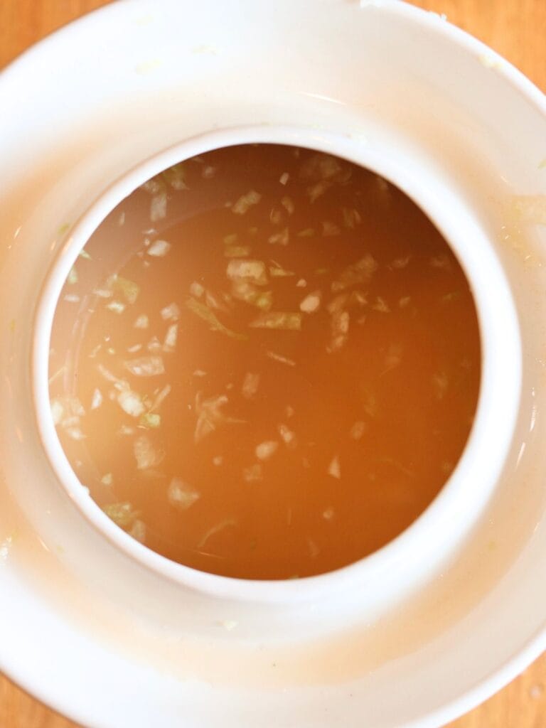 Cabbage juice in a crock.