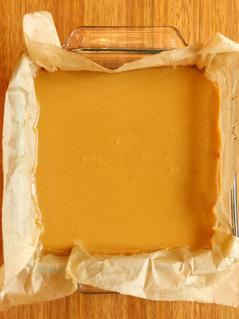 Lime curd baked and set in a glass baking dish.