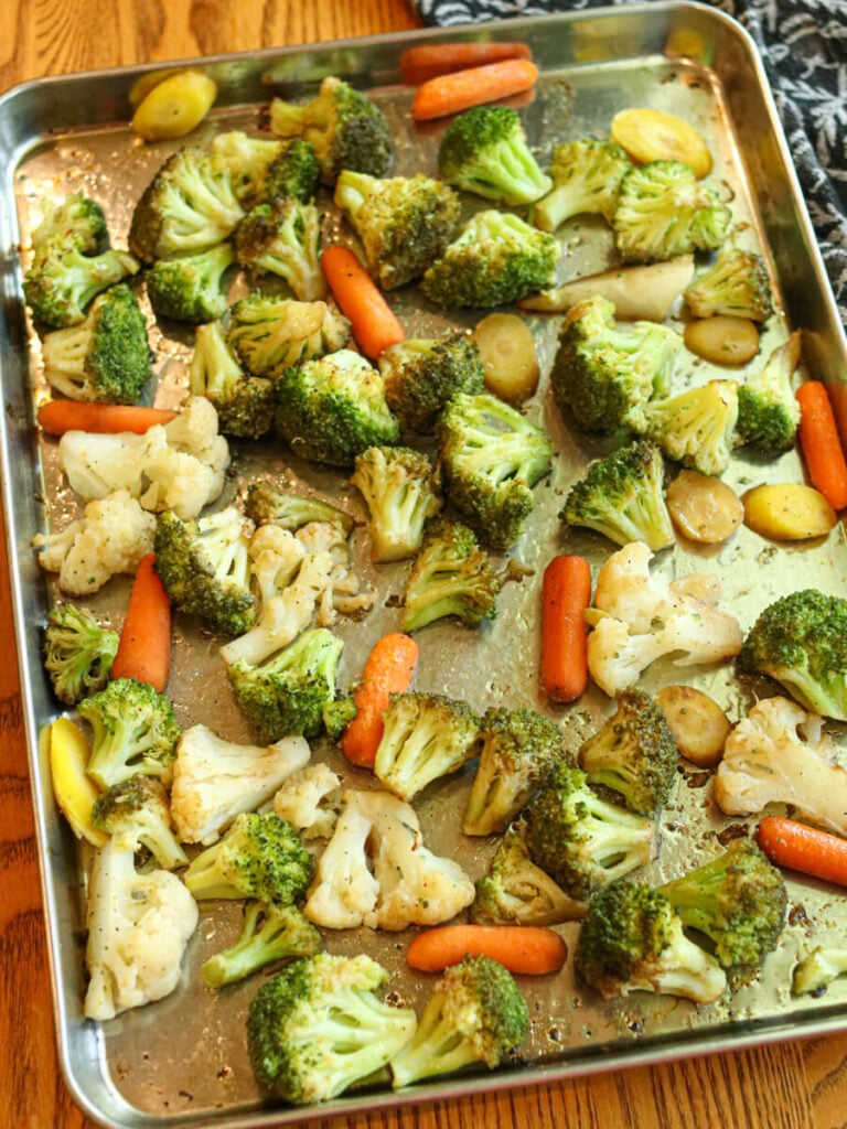 Roasted balsamic vegetables on a baking sheet right out of the oven.