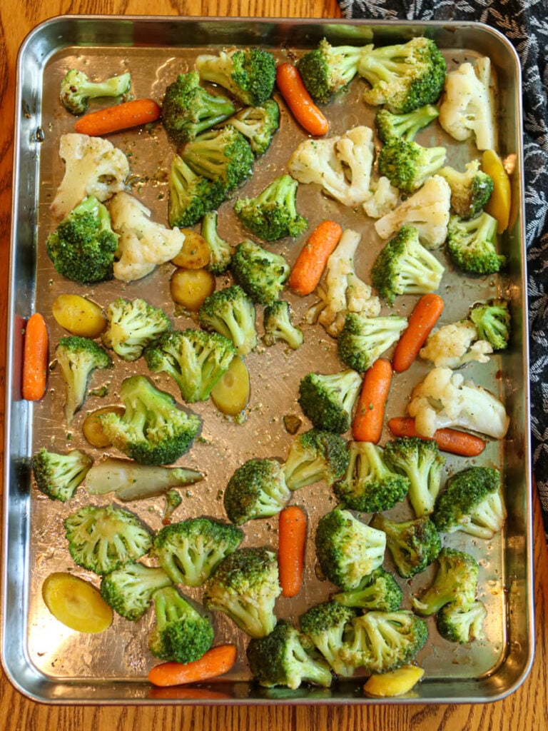 Partially-cooked vegetables tossed with olive oil, balsamic vinegar, salt, and pepper.